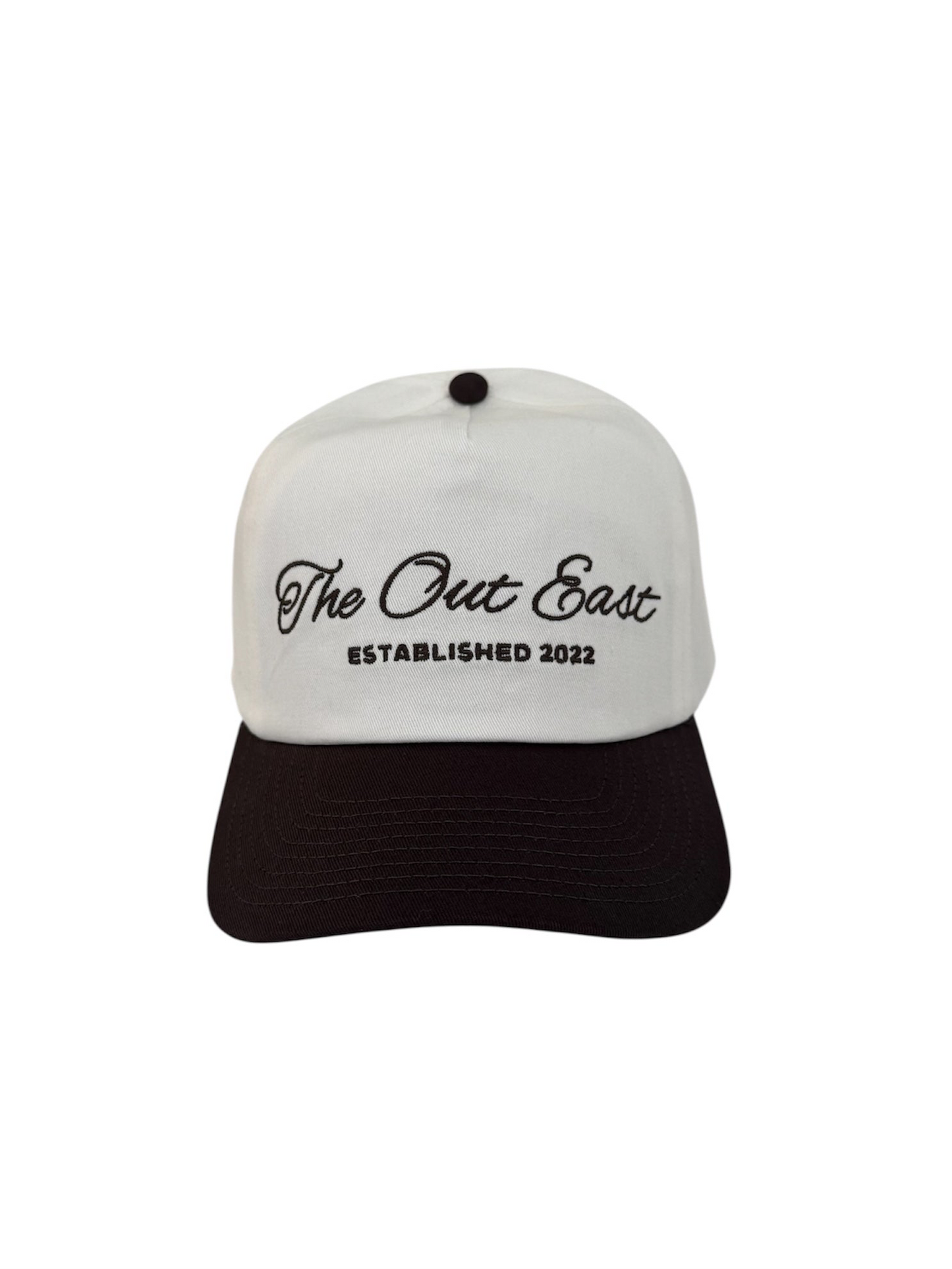 Off White and Chocolate Brown cap with 'The Out East Established 2022' embroidery. 